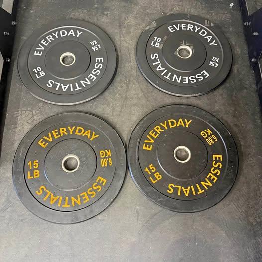 NEW 50lbs of Bumper Plates