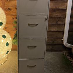 Four Drawer Metal Failing Cabinet With Keys.